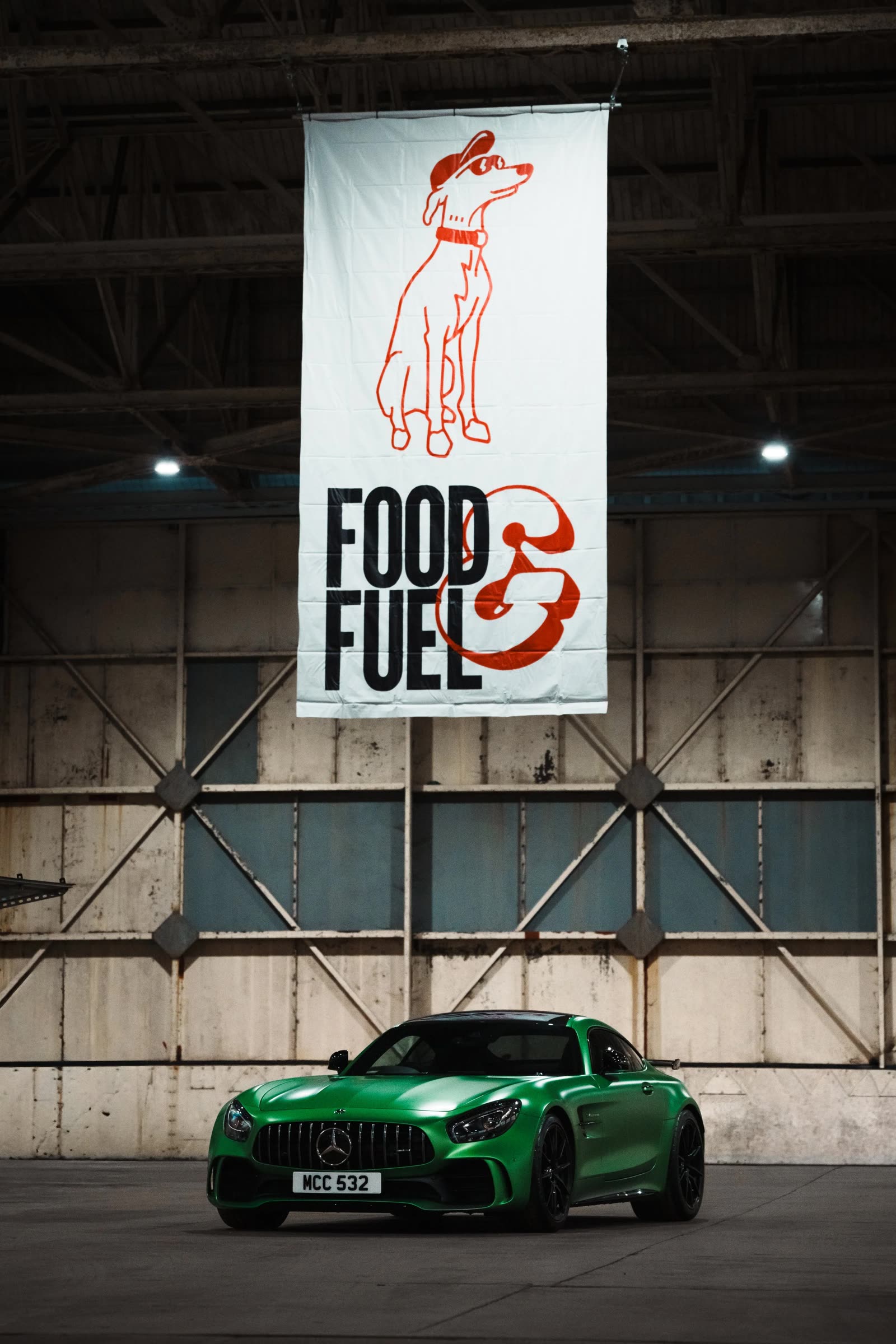 Food & Fuel banner over an AMG GT R